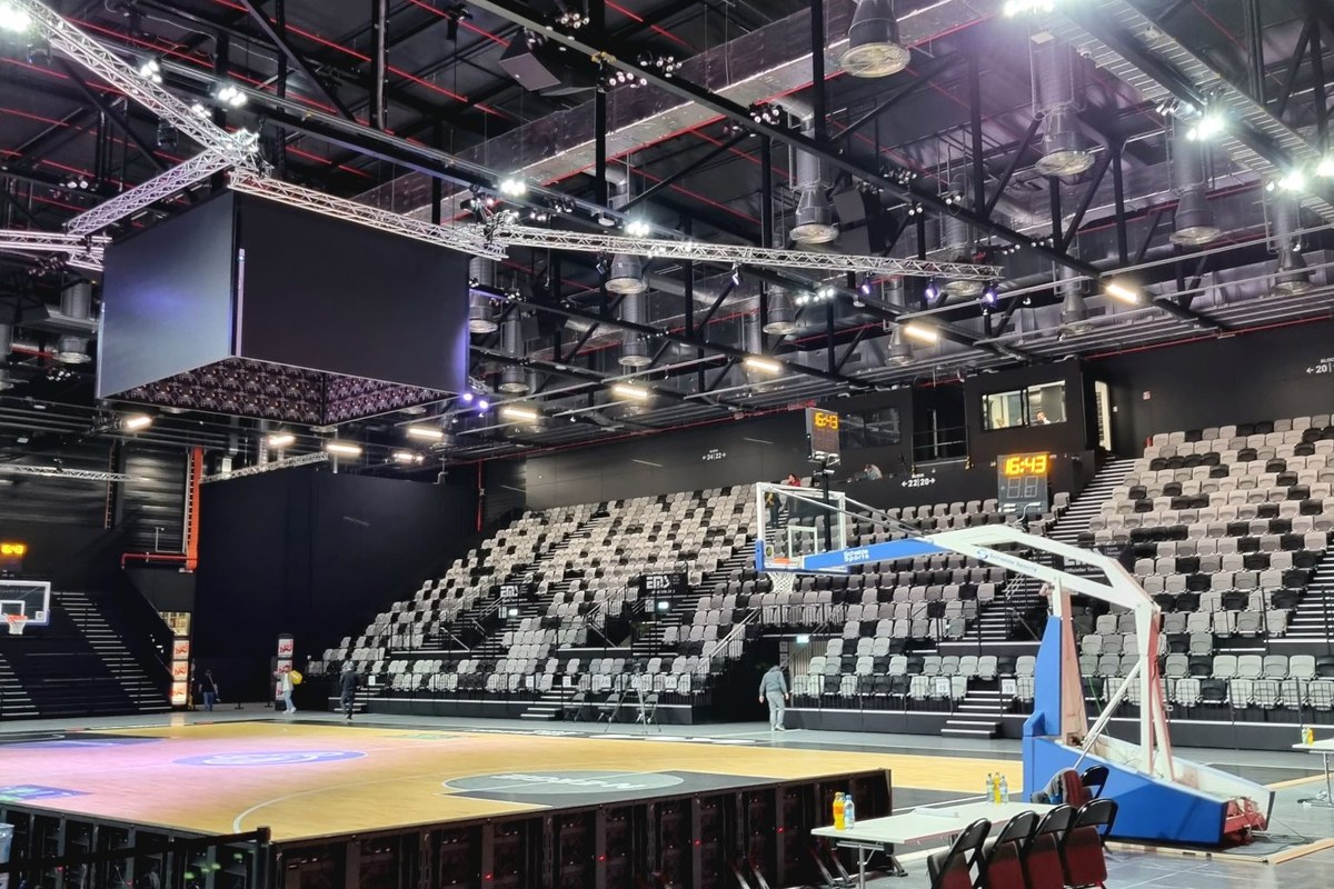 Empty basketball arena interior before tipoff - an illustrative venue photo, not a 2026-27 season game.