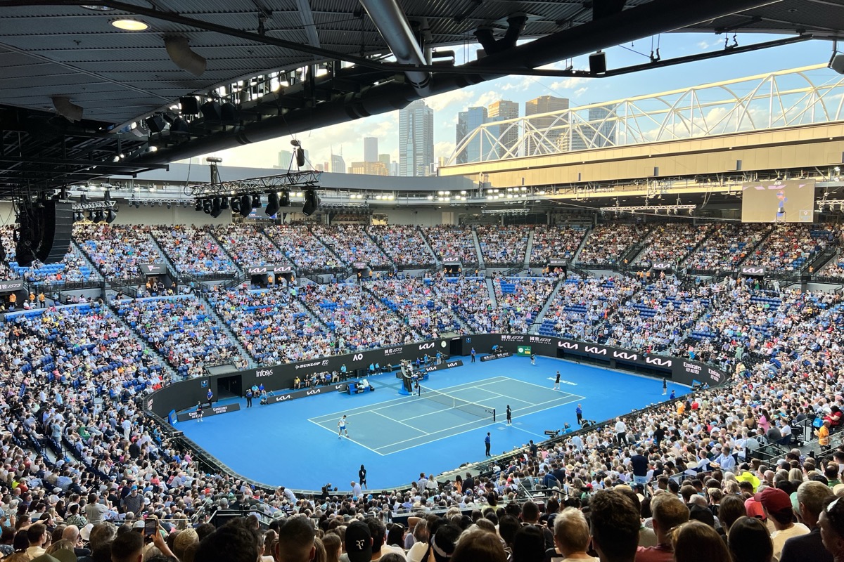 Rod Laver Arena during a 2023 Australian Open quarterfinal between Novak Djokovic and Andrey Rublev; historical context, not the 2027 tournament