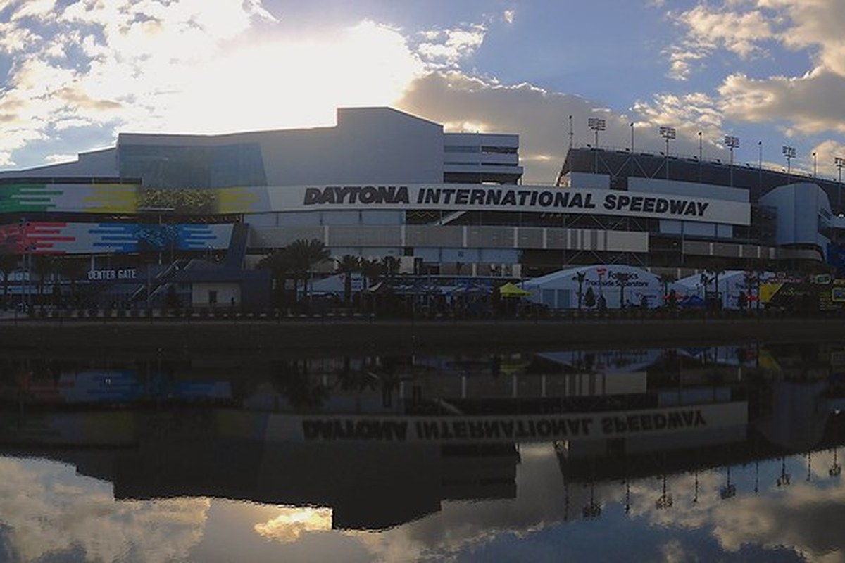 Exterior of Daytona International Speedway and its reflection, photographed February 20, 2016; historical venue context, not the 2027 race